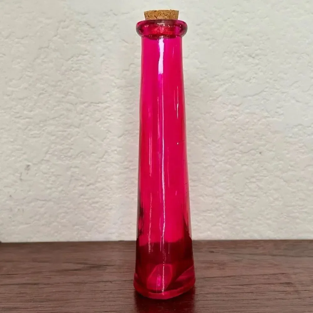 Vintage pink bottle with cork